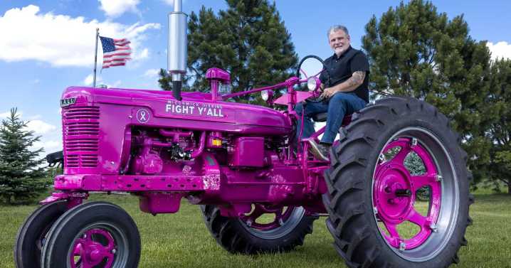 Why did a Waverly teacher paint a restored 1941 tractor hot pink?