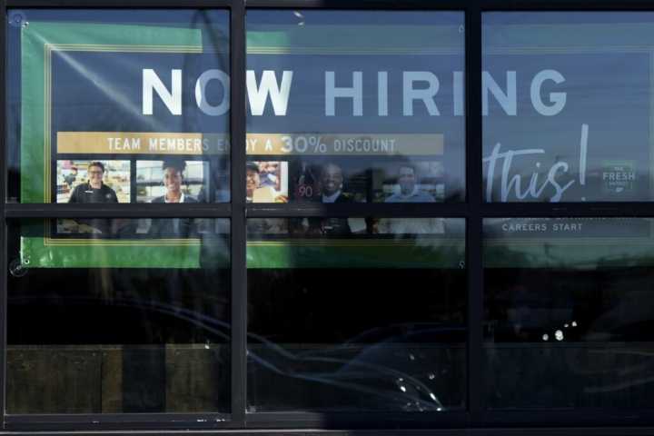 The number of Americans filing for jobless benefits last week rises to highest level in eight months