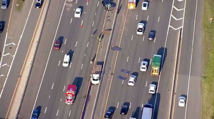 SUV crashes into back of truck causing steel plates to fall on Route 128 in Massachusetts, driver says