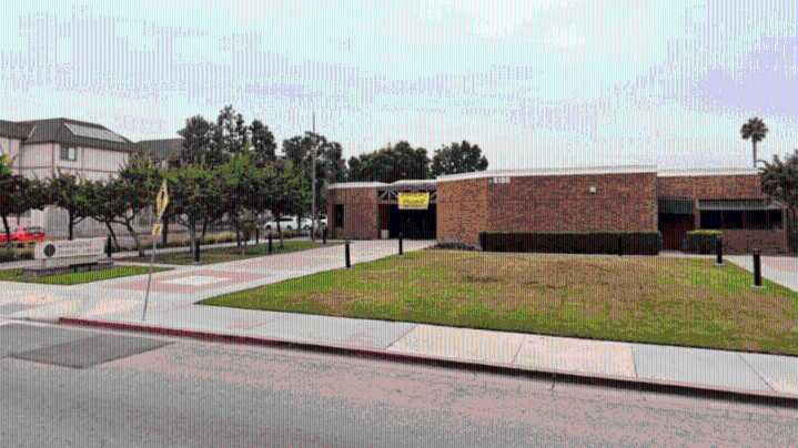 Suspect arrested after man found dead outside Orange County library