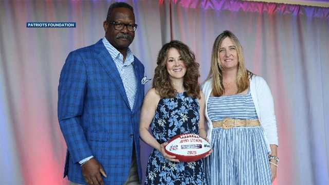 Woman recognized by Patriots for work with Manchester Police Athletic League