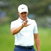 Champ leads Canadian Open as McIlroy crashes to missed cut
