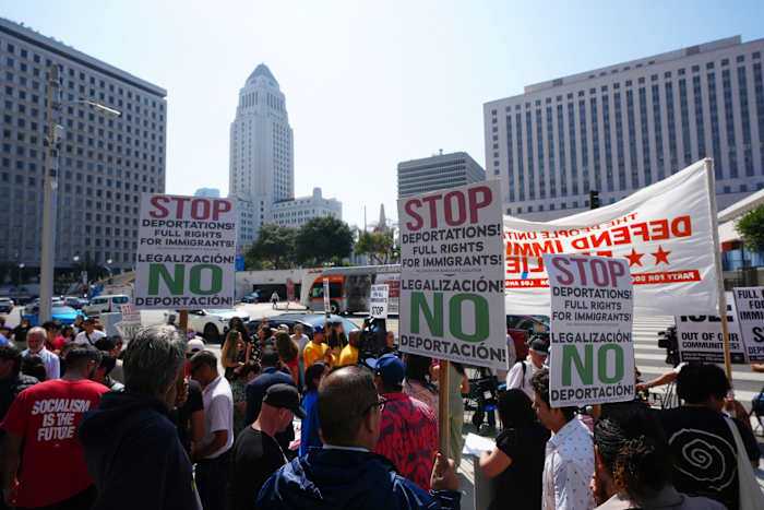 Immigration authorities carry out enforcement activity across Los Angeles amid crowds of protesters