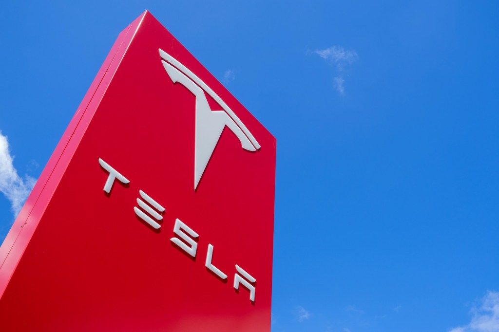 Tesla shares recover some losses as Musk