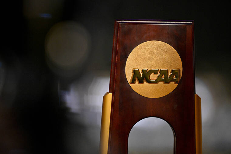 U.S. judge approves settlement allowing NCAA schools to pay athletes