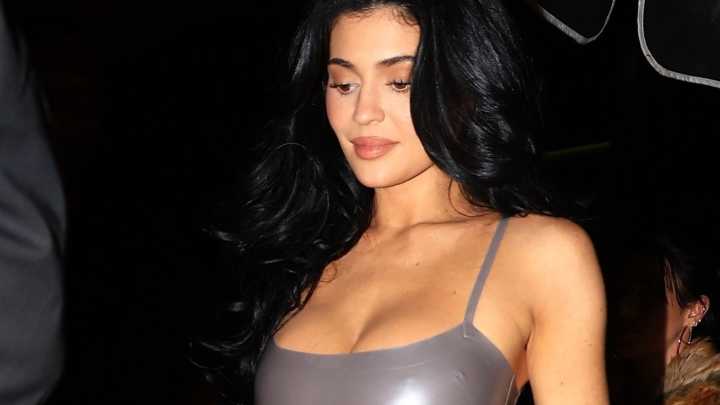 Kylie Jenner looks incredible in skintight silver mini-dress after revealing details of her surgery