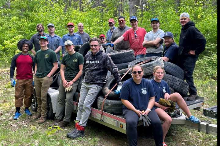 Volunteers clean up tires illegally dumped in Kinross Township