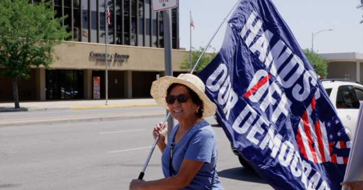 Community members and veterans stand up against the Trump administration