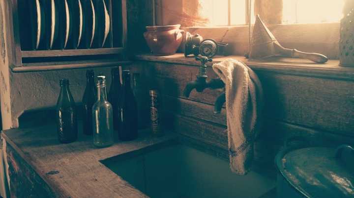 Mennonite Woman Eats Over the Sink to Avoid Doing Dishes
