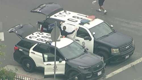 Man shot, wounded by police after allegedly pointing shotgun at LAPD officers in Harvard Heights, Los Angeles