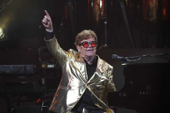 Elton John says ‘we will not back down’ in awards speech addressing AI concerns