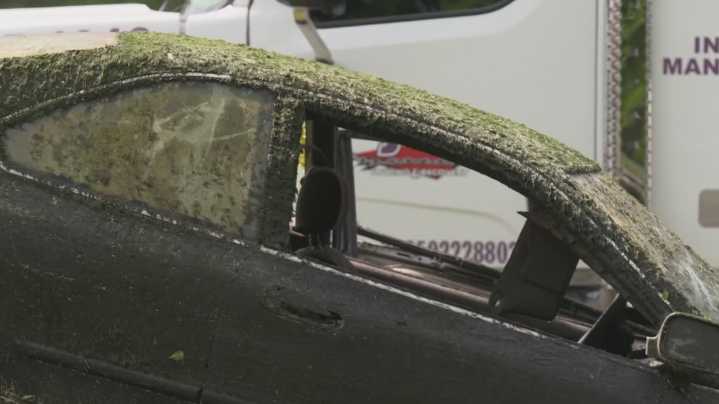 At least 10 cars found underwater in Dallas pond