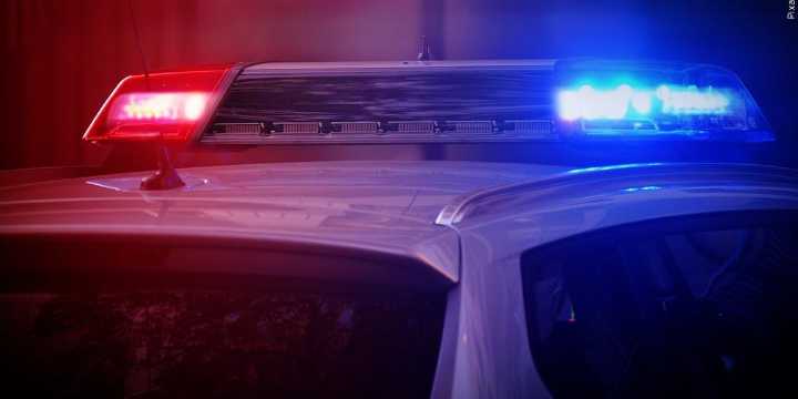 Body found in vehicle sitting “for some time” in parking ramp