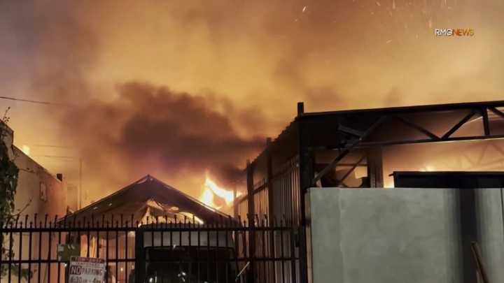 Fire burns a home, businesses in South LA