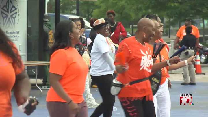 Sea of orange fills Rochester’s Parcel Five for event to end gun violence