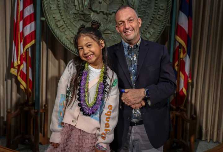 Green signs law to protect young performers; he is joined by ‘Lilo and Stitch’ star from Kona