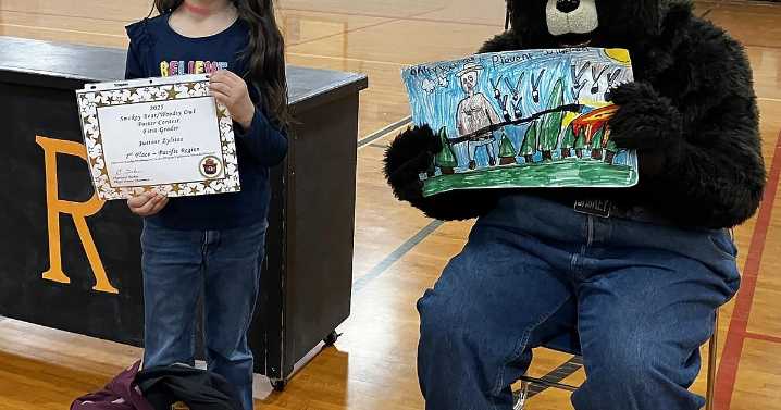 Smokey Bear visits PRE poster contest winners