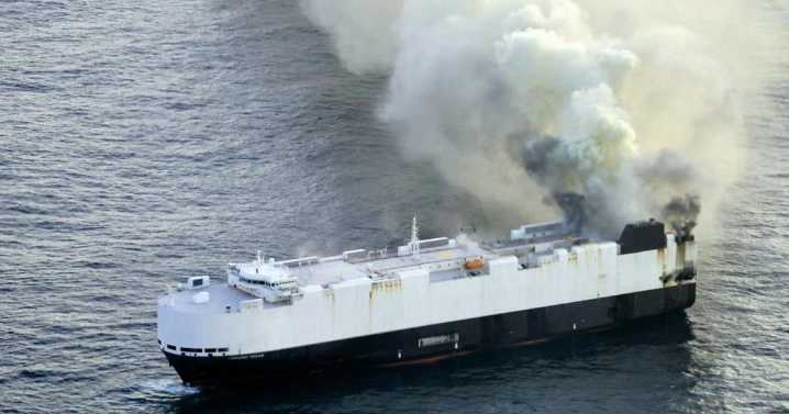 Crew of 22 rescued after cargo ship carrying 3,000 vehicles catches fire