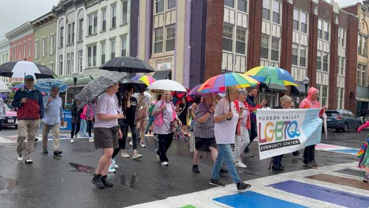 Kingston’s first-ever LGBTQ+ Pride march draws hundreds