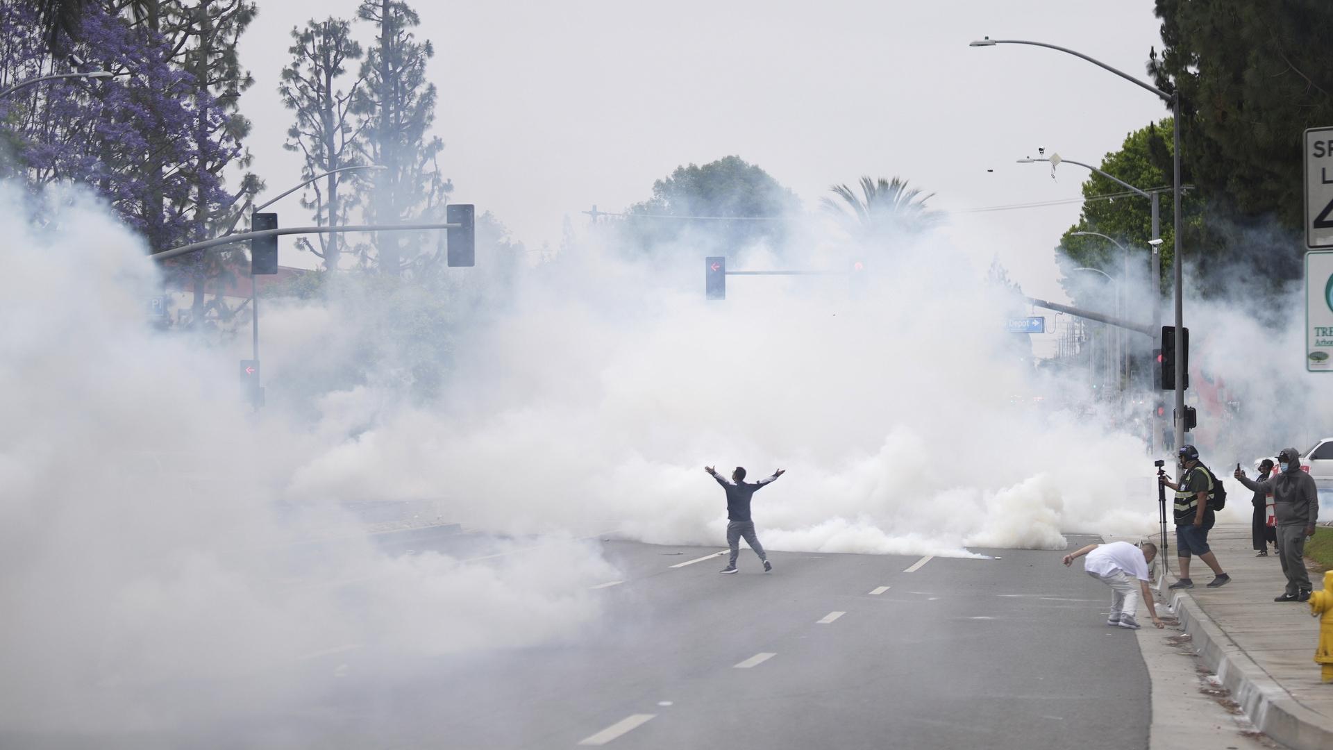 Protesters and immigration authorities face off for a second day in LA area after arrests