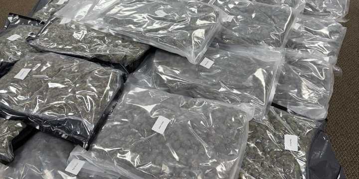 2 arrested after nearly 50 bags of marijuana found in vehicle being towed by wrecker