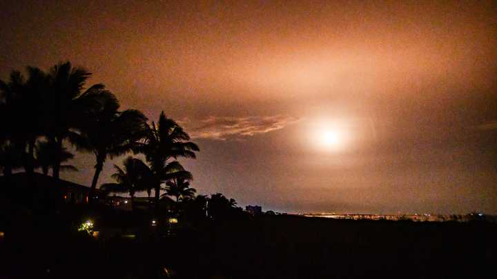 Rocket's glow lights up the clouds over Brevard
