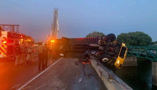 Crews rescue driver from truck hanging over San Joaquin River