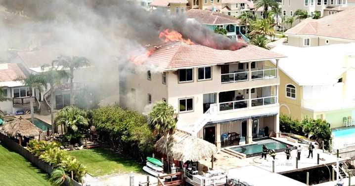 Crews respond to fire at 3-story home in Pasco County