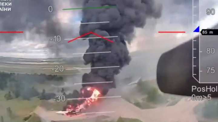 Incredible new footage of Ukraine's Op Spiderweb shows smuggled drone taking off & swooping on Putin's burning bombers