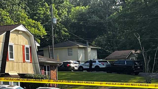 Neighbor finds woman dead outside Birmingham residence