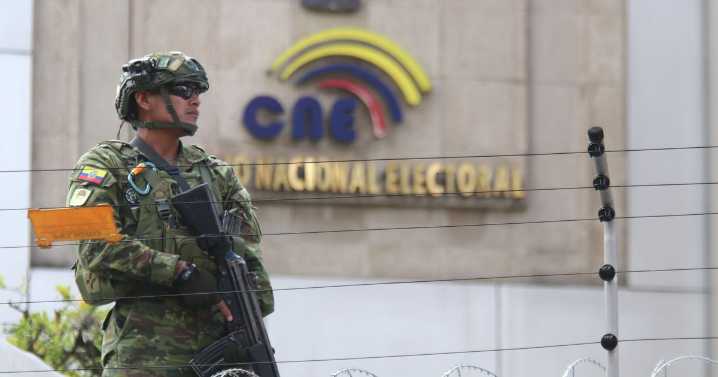 Five dead and girl, 2, injured as gunmen open fire on group watching football match