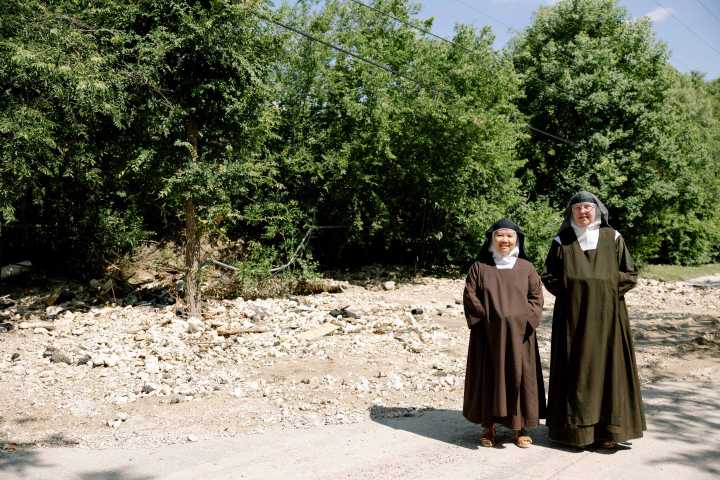 Cloistered nuns prayed for rain. It sent debris crashing into their monastery and a flood of help.