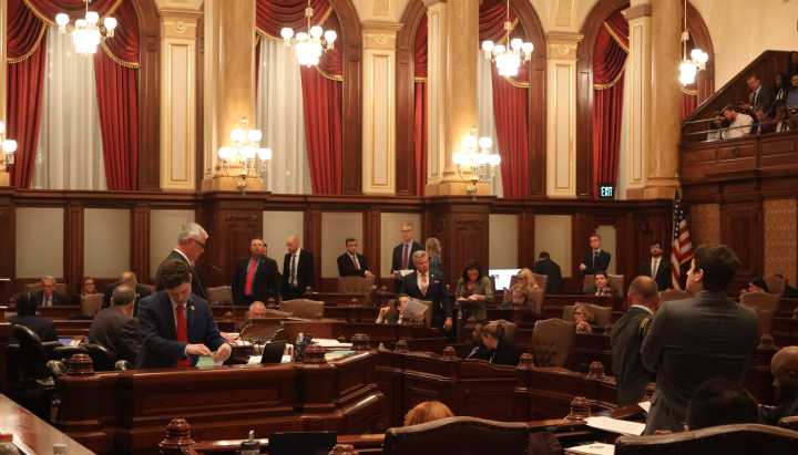 A bill to reform Chicago's mass transit and charge a $1.50 delivery fee stalls in Illinois House
