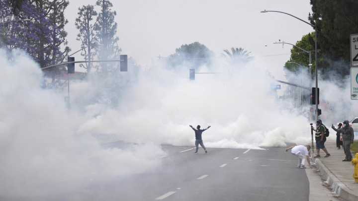 Protesters clash with federal authorities during immigration raid in California