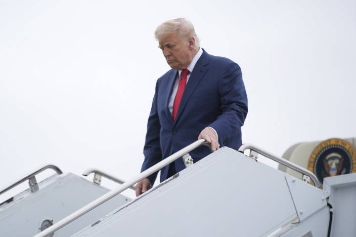 The Latest: Trump’s travel ban takes effect as tensions escalate over immigration enforcement