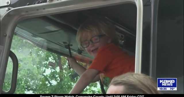 Trucks of all kinds line the street at Wichita's annual Touch a Truck event