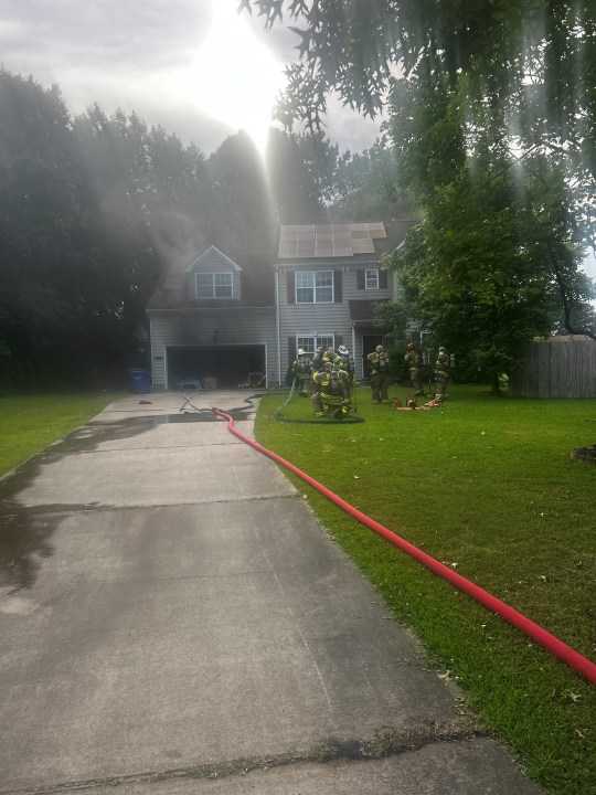 Family of 6, 2 dogs, displaced after house fire