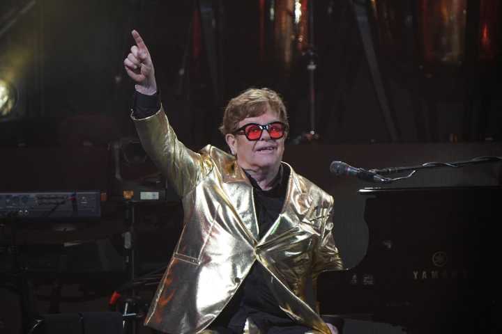 Elton John says ‘we will not back down’ in awards speech addressing AI concerns