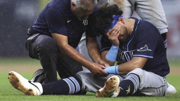 Rays lose 3 players to injury, fall to Yankees after long rain delay