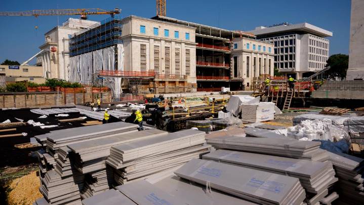 Trump and Powell bicker over cost of Fed building renovations as president visits site