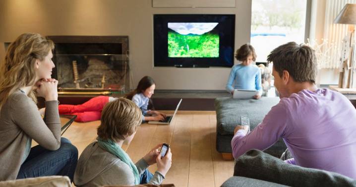 Average family uses three screens at the dinner table as tech addiction soars