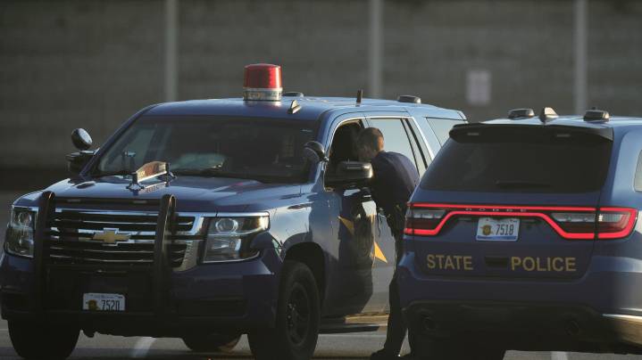 A man accused of stabbing 11 people at a Walmart is in Michigan authorities' custody