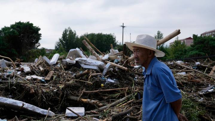 Heavy rains and flooding kill at least 34 people in and near Beijing