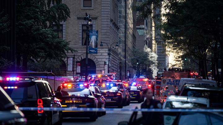 Gunman kills 4, including police officer, in shooting at New York City office tower