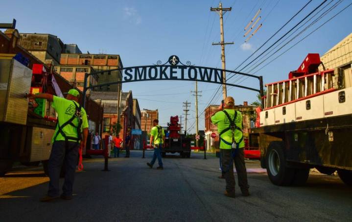 What are those signs popping up in Louisville neighborhoods? We found out.