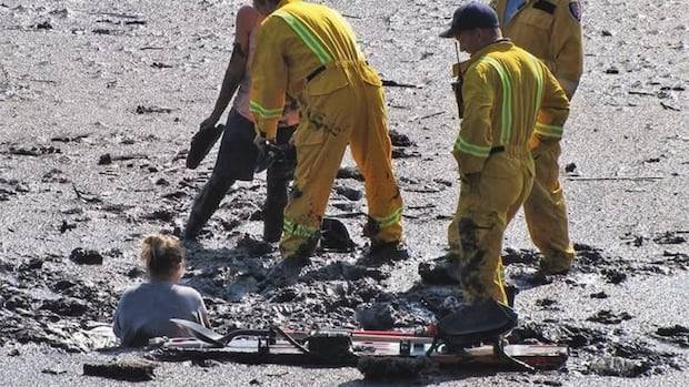 Port Moody, B.C., officials urge people to stay off mudflats which can act like quicksand