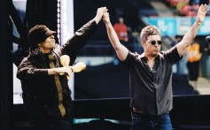 Tom Cruise Attends Oasis Concert Despite Gallagher Brothers Once Claiming They ‘Hate’ the ‘Little F