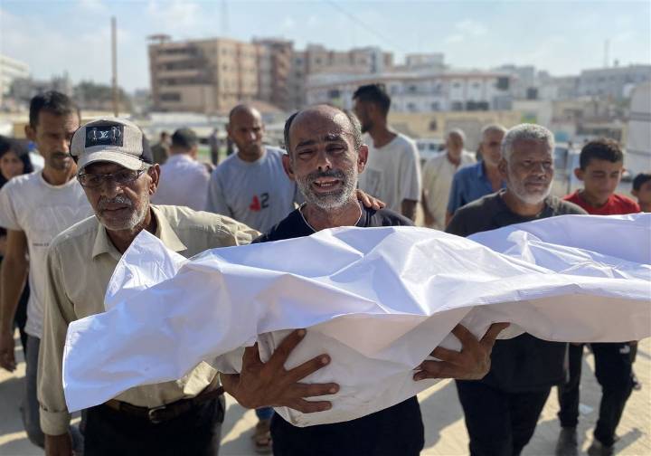 Israeli strikes kill at least 36 people in Gaza, officials say, as some aid restrictions are eased