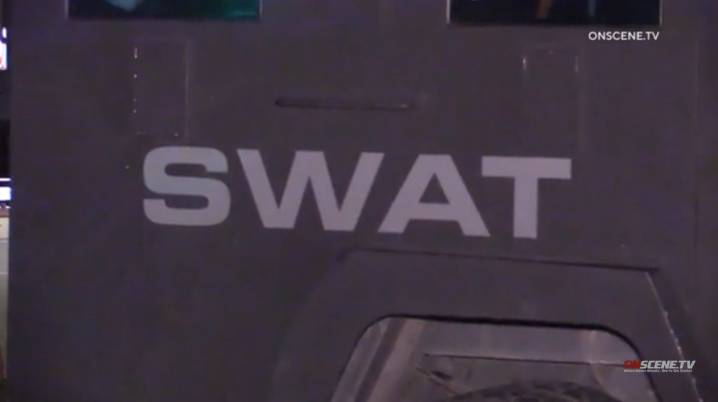 Man arrested in SWAT standoff after alleged attack of ex