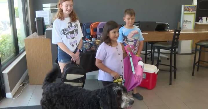 Backpack giveaway helps ease high cost of back